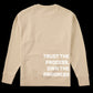 Beige sweatshirt with 'Trust the process, own the progress' text on a black background