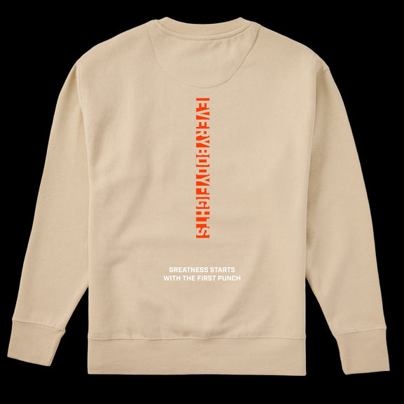 Beige sweatshirt with red and white text on a white background