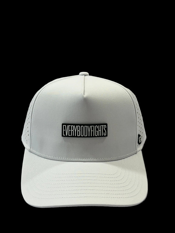 White cap with 'EVERYBODYFIGHTS' logo on a white surface